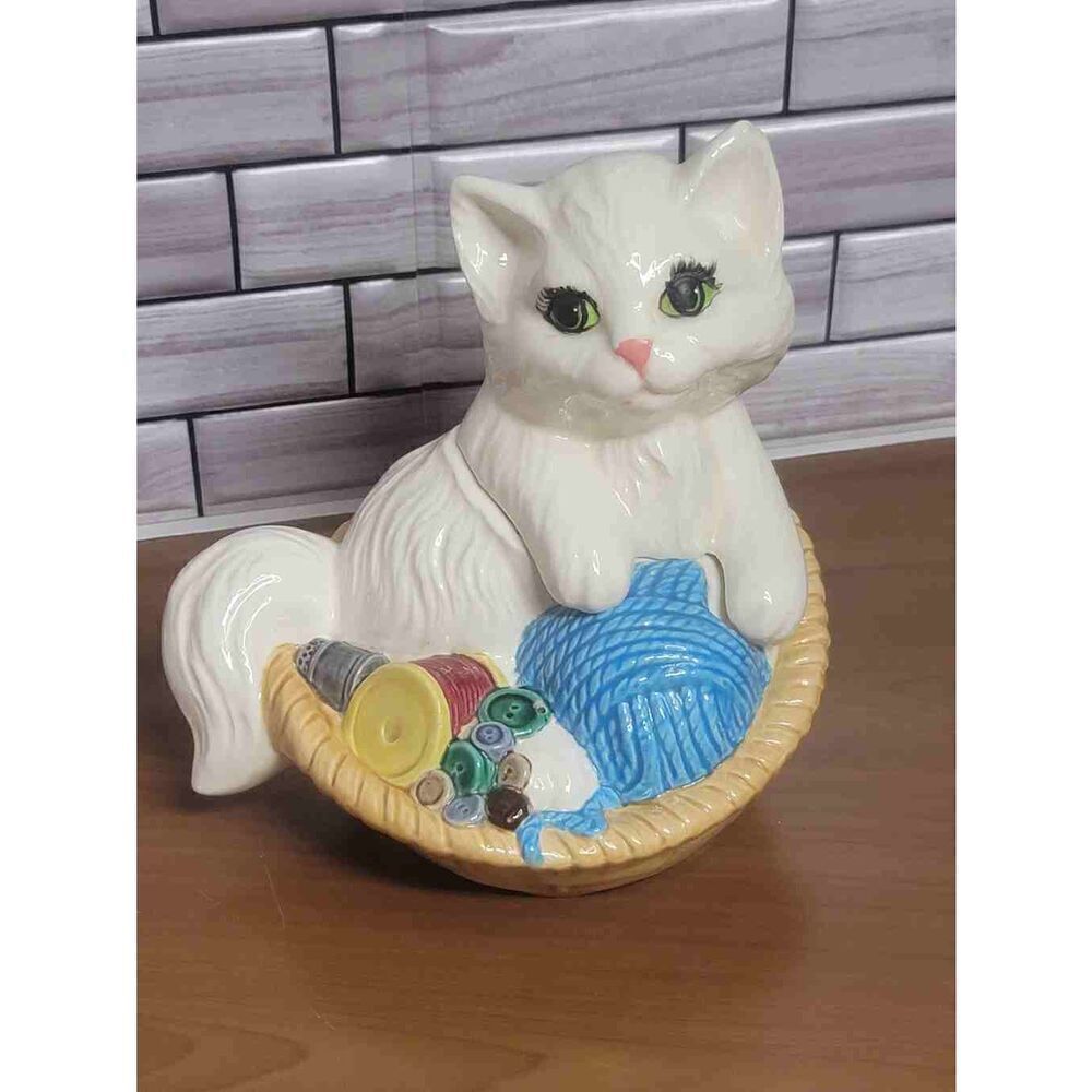 Vintage ceramic white kitten in a brown ceramic basket On Ceramic Yarn